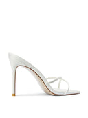 Donatella 100 in Patent White, side view showing the pointed toe, thin straps, and stiletto heel