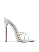 Donatella Mule in Patent White, side view showing the pointed toe, thin straps, and tall stiletto heel