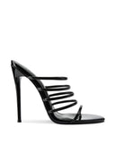 Kalós Slipper in Patent Black - side view of multi-strap mule with open pointed toe and stiletto heel