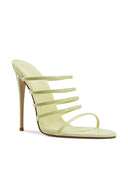 Kalós Slipper in Yellow patent - side profile view showing the slim parallel straps and self-covered stiletto heel