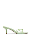 Maeve Slipper in Celestial Sage - side view of satin kitten-heel mule with knotted strap and open toe