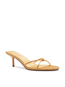 Maeve Slipper in Orange - side profile view showing the low self-covered heel