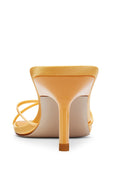 Maeve Slipper in Orange - back view of the low, self-covered stiletto heel