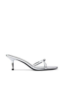 Maeve Slipper in Platinum metallic finish, front view of knotted strap over open toe